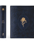 Versailles NLT Notetaking Bible cover with visible spine, gold floral design, and leather-like finish