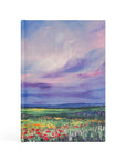 Cana Christian notebook with purple and blue landscape design and vibrant red wildflowers inspired by the miracle at Cana