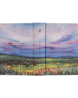 Full wrap cover of Cana NLT journaling Bible showing front, spine, and back landscape design with wildflowers