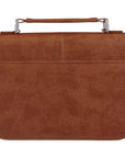 Back view of Faith honey brown faux leather Bible cover showing full-length slip pocket, stitched design, and lay-flat carry handle for Christian Bible storage and protection