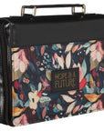 Hope and a Future Botanical Midnight faux leather Bible cover with floral design, angled view showing zipper closure, gold-foiled title, and structured protective case for Christian Bible
