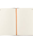 Open Palma Christian notebook showing lined pages with ribbon bookmark and brown leather-like cover
