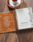 Pearlized White My Creative Bible KJV open to the illustrated owner personalization page with Isaiah 64:8 inside cover