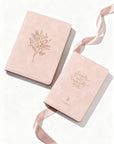 Shiloh NLT Journaling Bible and matching suede journal displayed together as a coordinated Christian gift set.