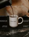 Coffee pouring into a Love You stoneware mug. Graphic lists 14 oz capacity, USA design, microwave and dishwasher safety, and designs on both sides.