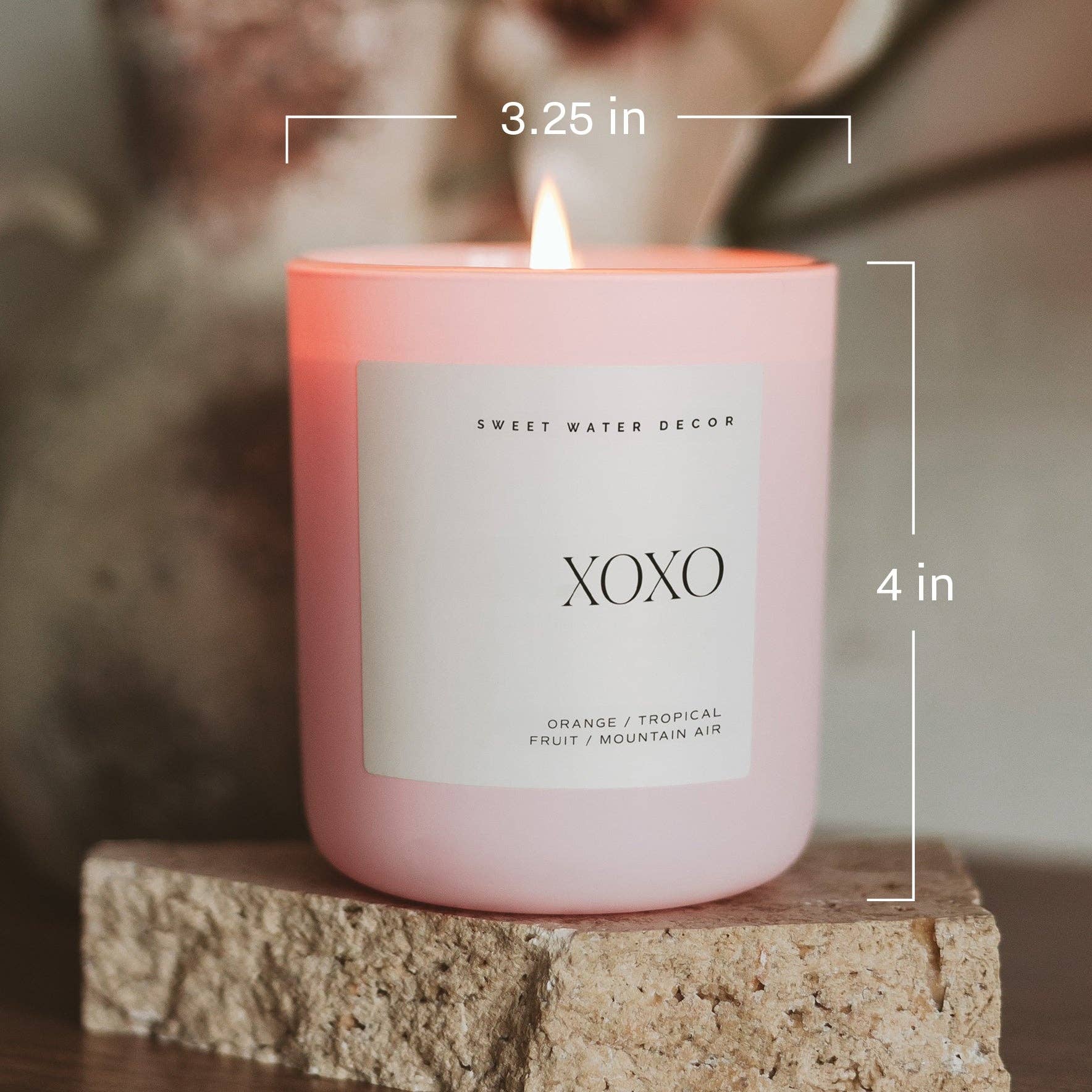 15 oz pink soy candle showing dimensions 3.25 inches wide and 4 inches tall in glass jar