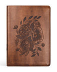 A leather-like soft cover ESV Study Bible with a floral design embossed on the front.