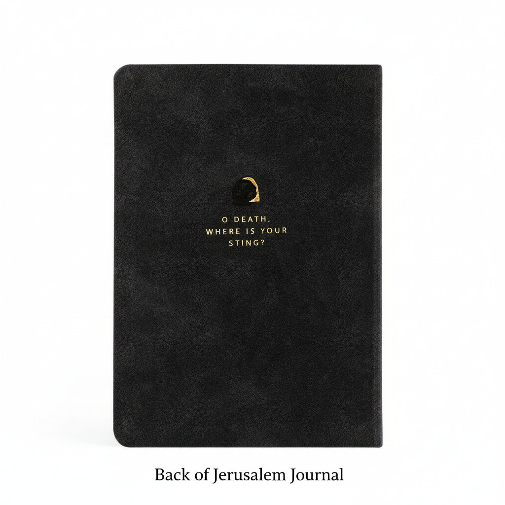 Back cover of the Jerusalem journal with gold text reading ‘O death, where is your sting?’ on a black suede-like cover.