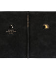 Full cover spread of the Jerusalem journal showing the front, back, and spine with gold sunrise artwork and the Scripture ‘O death, where is your sting?’ on a black suede-like cover.