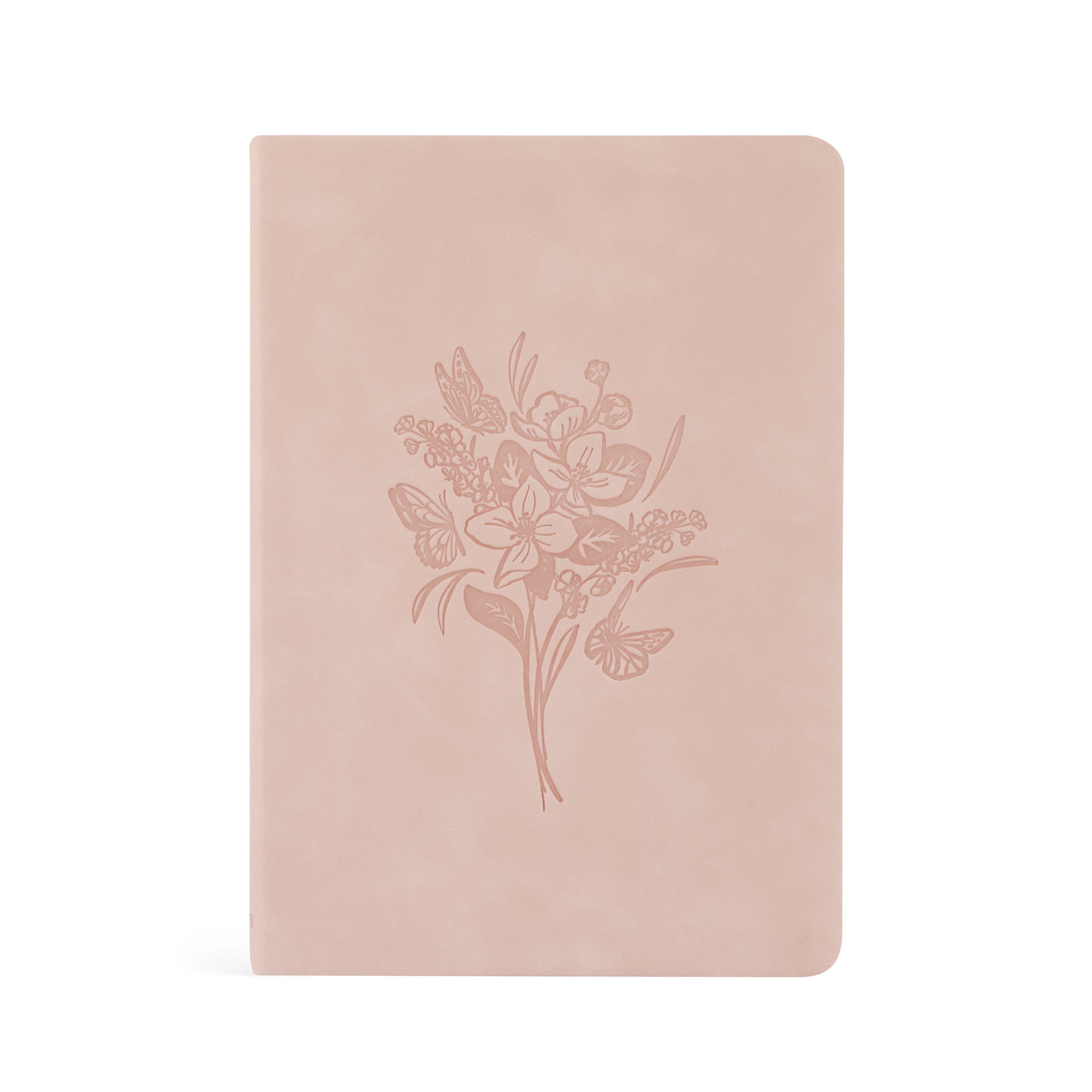 A blush pink suede notebook with a floral embossed design on the cover.