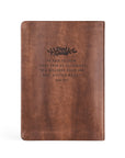 Aurora Christian notebook journal back cover with Mark 6:31 Scripture on warm brown leather-like cover for prayer journaling, Scripture reflection, and devotional writing