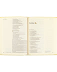 Open Belfast NLT journaling Bible showing wide lined margins and Psalms layout for note-taking