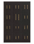 Black book cover with gold text listing Bible chapters on a white background