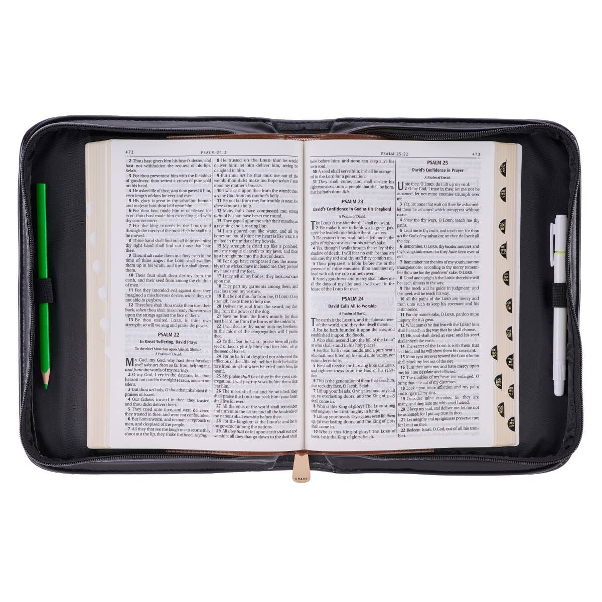 Interior view of Blessed black croc faux leather Bible cover laid open with Bible inside, showing pen loops, zipper, and interior organization