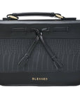 Front view of Blessed black croc faux leather Bible cover with tassels and gold lettering