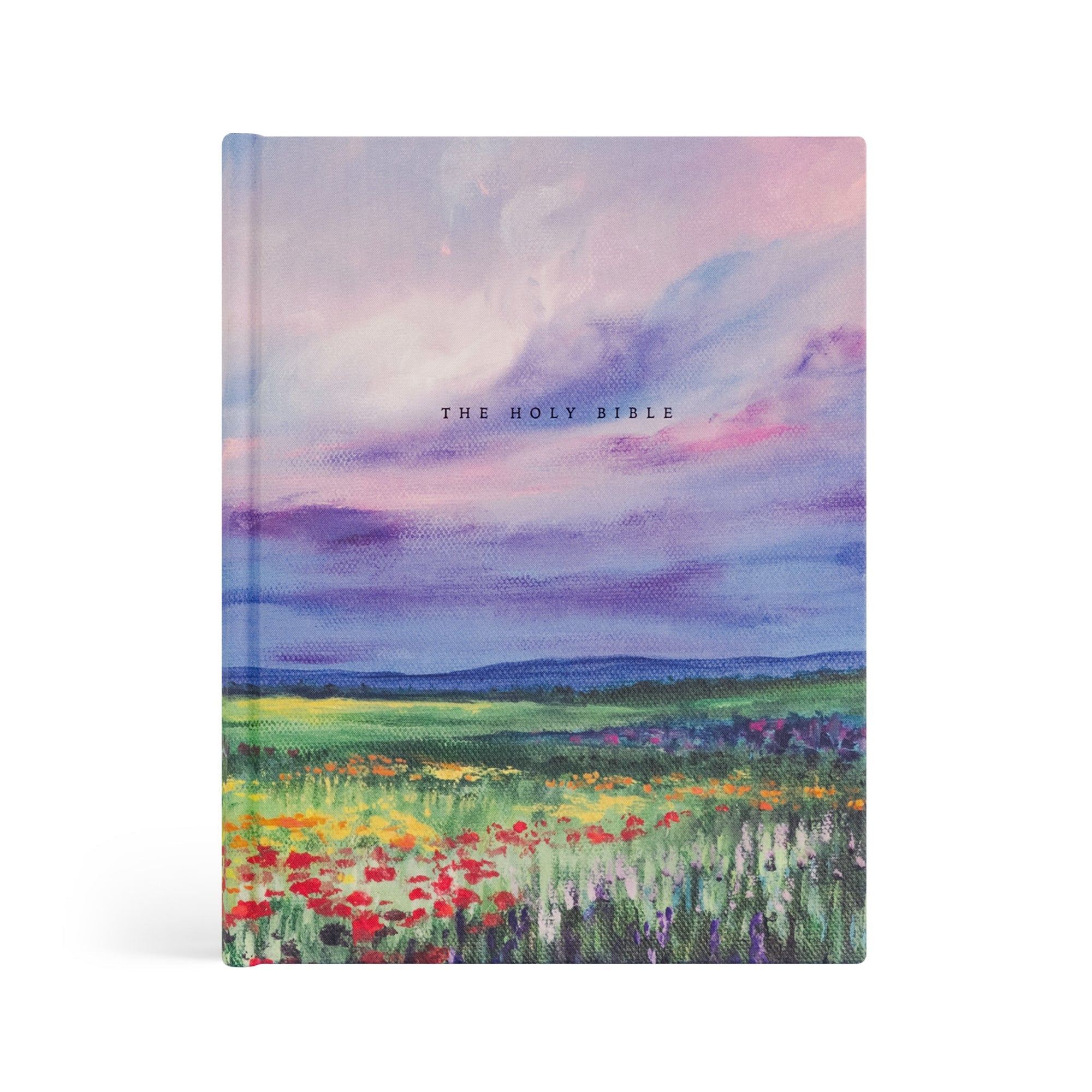 Cana NLT journaling Bible in purple and blue landscape design and wildflowers on hardcover with the text "The Holy Bible"