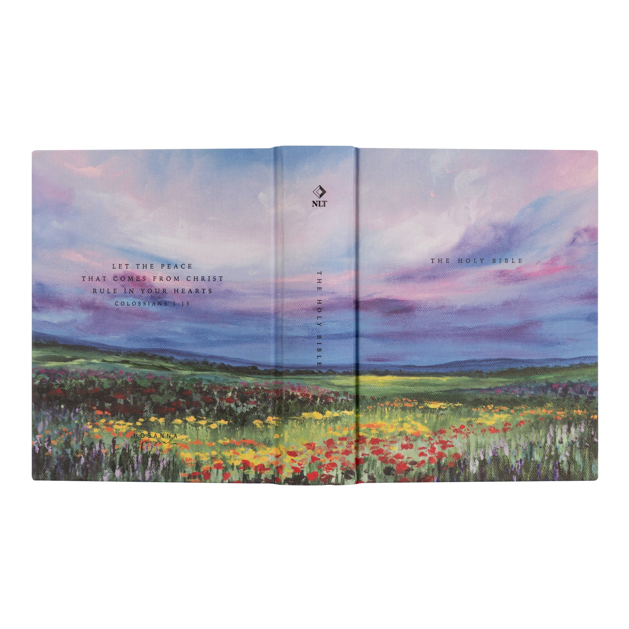 Full wrap cover of Cana NLT journaling Bible showing front, spine, and back landscape design with wildflowers