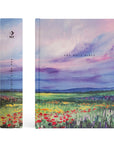 Spine and front cover of Cana NLT journaling Bible with purple and blue landscape and wildflower design