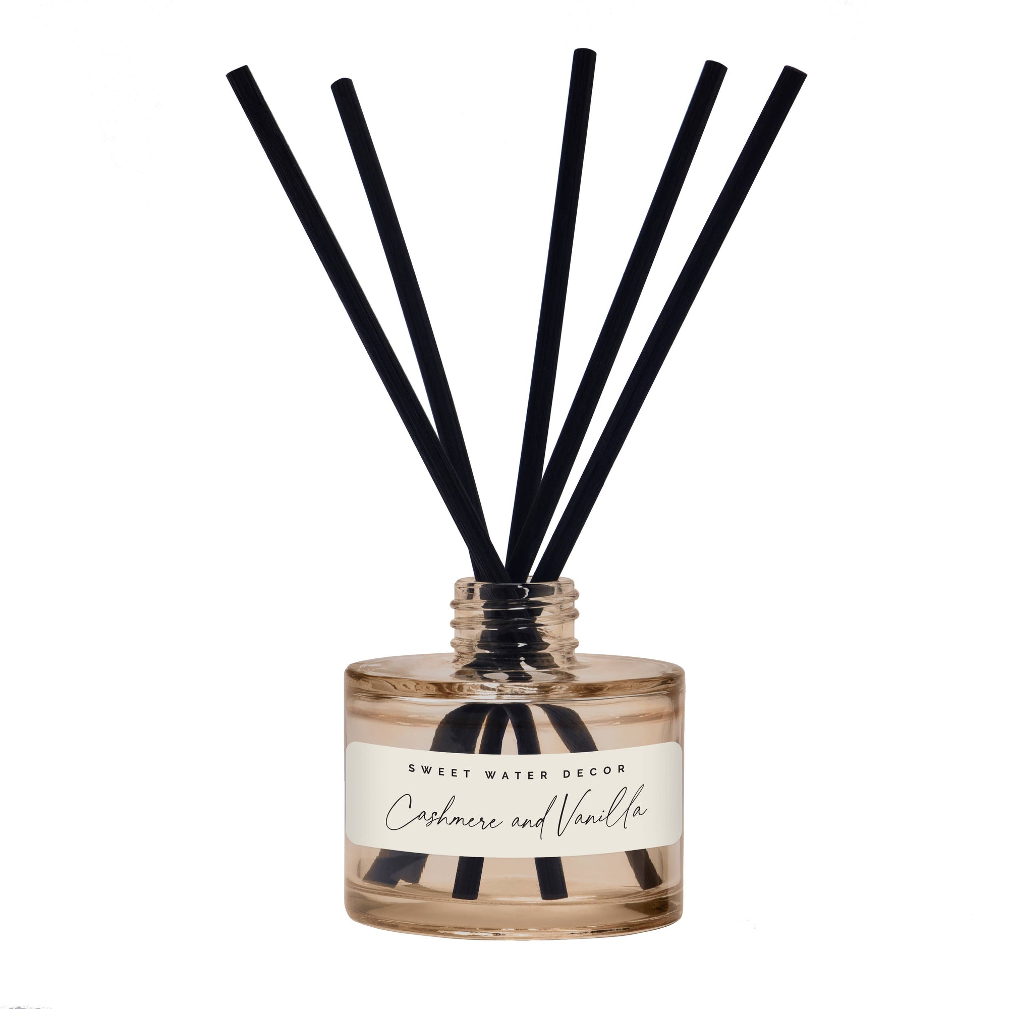 Cashmere and vanilla reed diffuser labeled with black reeds on a white background.