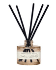 Cashmere and vanilla reed diffuser labeled with black reeds on a white background.