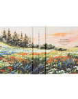 Coram 5 year prayer journal full wrap cover showing floral landscape with trees and sunset design