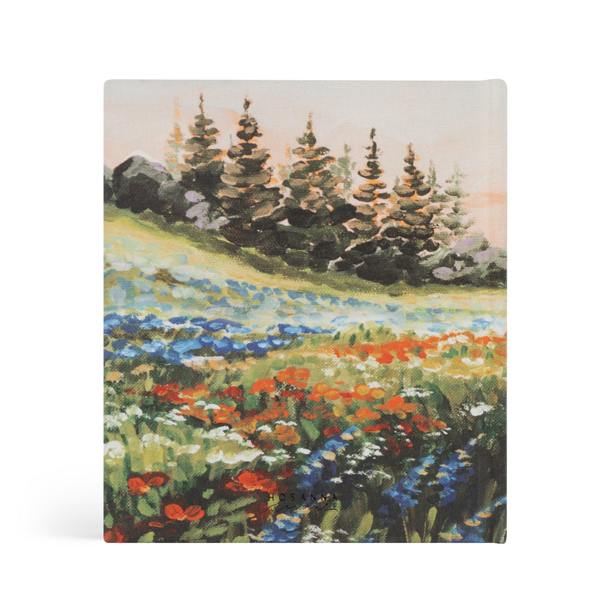 Back cover of Coram prayer journal floral landscape with wildflowers and trees inspired by Montana scenery. 