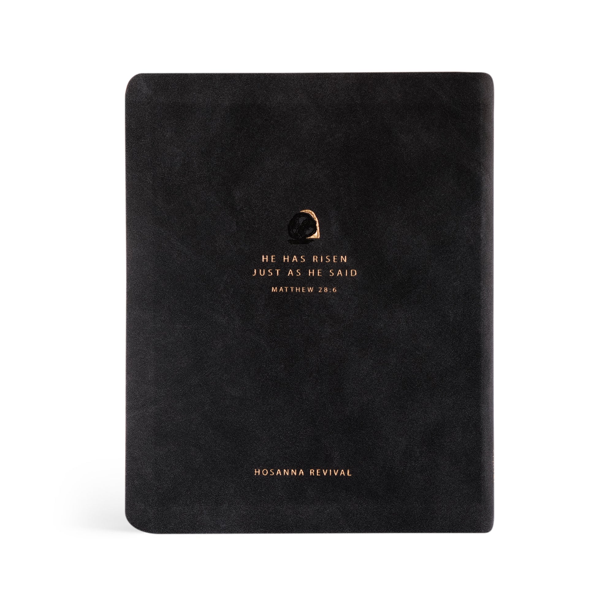 Back cover of the CSB Jerusalem Bible by Hosanna Revival, featuring black suede with gold-foil Matthew 28:6 inscription, ‘He has risen just as He said,’ above a minimalist tomb illustration.