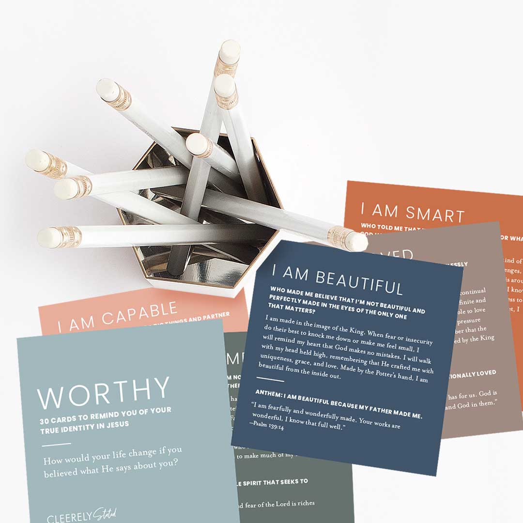 Lifestyle photo of Identity in Christ Scripture Cards arranged around a pencil cup, featuring cards titled Worthy, I Am Capable, I Am Beautiful, and I Am Smart—Christian affirmation cards designed to encourage believers with biblical truth about their identity in Jesus.