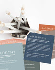 Lifestyle photo of Identity in Christ Scripture Cards arranged around a pencil cup, featuring cards titled Worthy, I Am Capable, I Am Beautiful, and I Am Smart—Christian affirmation cards designed to encourage believers with biblical truth about their identity in Jesus.