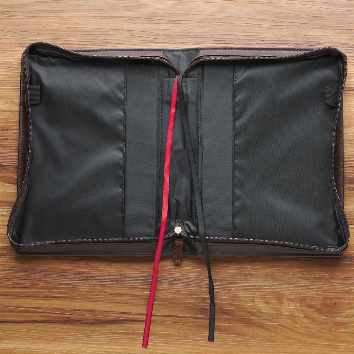Interior of large faux leather Bible cover with pen loops and ribbon bookmarks
