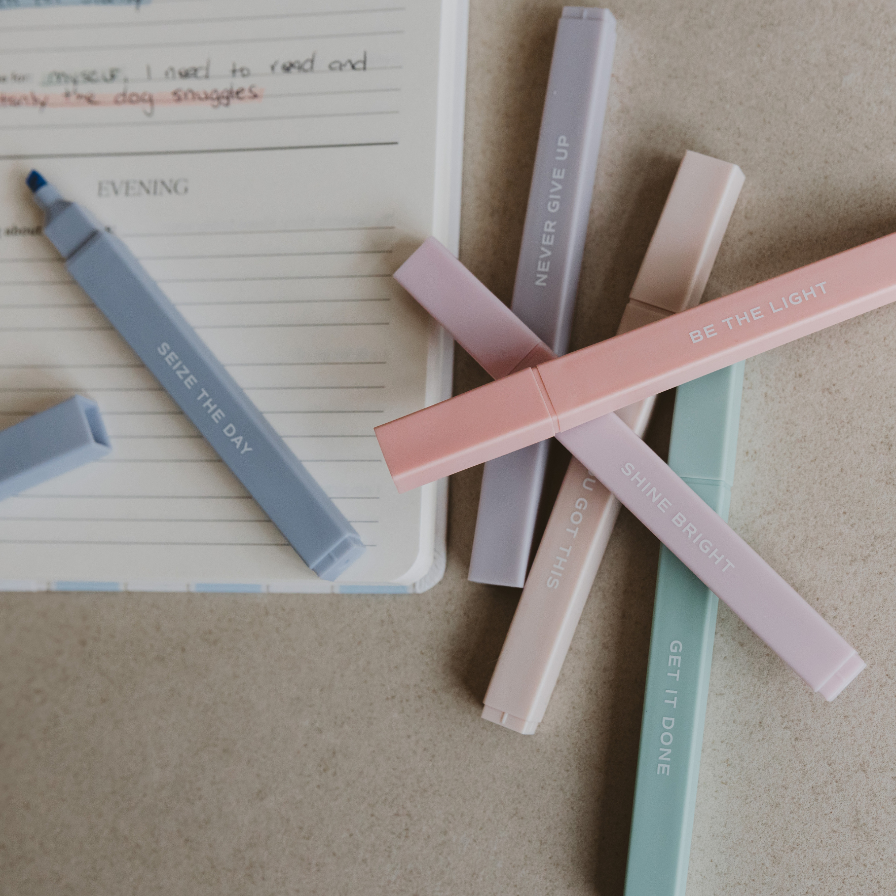 Neutral inspirational highlighter set showing muted pastel colors with motivational messages including You Got This, Be The Light, and Never Give Up