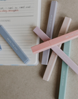 Neutral inspirational highlighter set showing muted pastel colors with motivational messages including You Got This, Be The Light, and Never Give Up