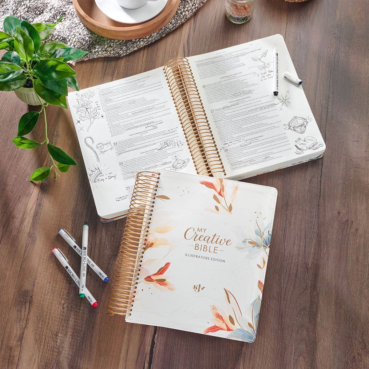 Pearlized White My Creative Bible KJV shown open for note-taking with wide journaling margins and lay-flat spiral binding