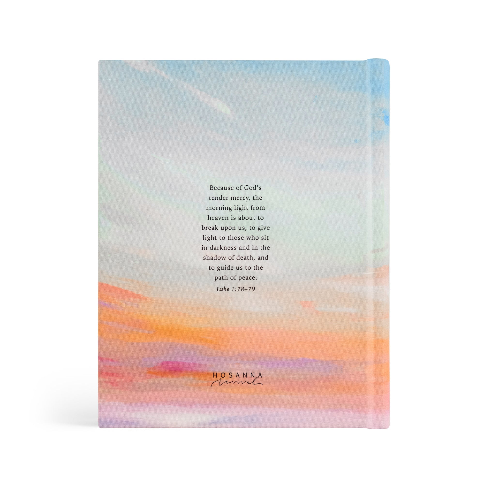 Back cover of Rosemary Beach NLT journaling Bible featuring Luke 1:78-79 with soft sunrise sky design