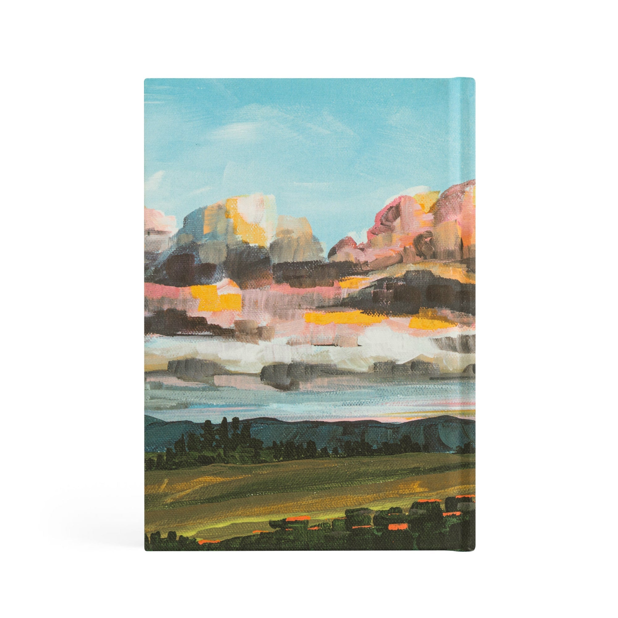 Back cover of Santa Lucia Christian notebook featuring hand-painted sunrise landscape artwork in soft morning colors