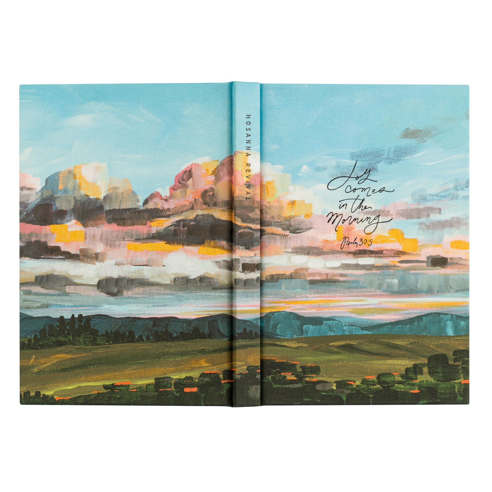 Full wrap cover of Santa Lucia Christian notebook showing sunrise landscape artwork with Joy Comes in the Morning Psalm 30:5 design