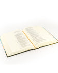Santa Lucia ESV journaling Bible open at an angle showing Scripture text and wide lined margins for note taking