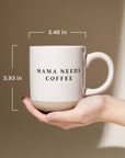 Hand holding a Mama Needs Coffee cream stoneware mug, with dimensions labeled 3.46 inches across and 3.93 inches tall.