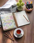 Teal My Creative Bible Spiral Bound Illustrators Edition KJV open to a colorful Philippians Bible journaling page