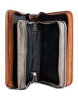 Open Bible Covers come in 2 sizes. The larger size in brown faux leather the smaller size in grey faux leather with interior compartments displayed on a white background