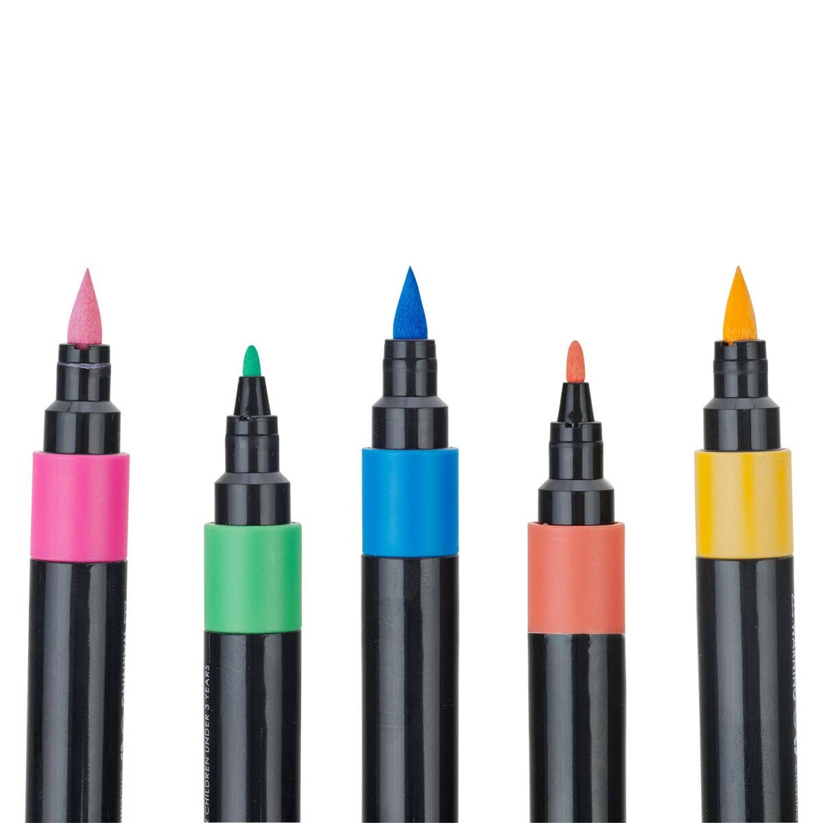 Close-up of Veritas Color acrylic paint markers showing pink, blue, and yellow brush tips and green and coral fine tips.