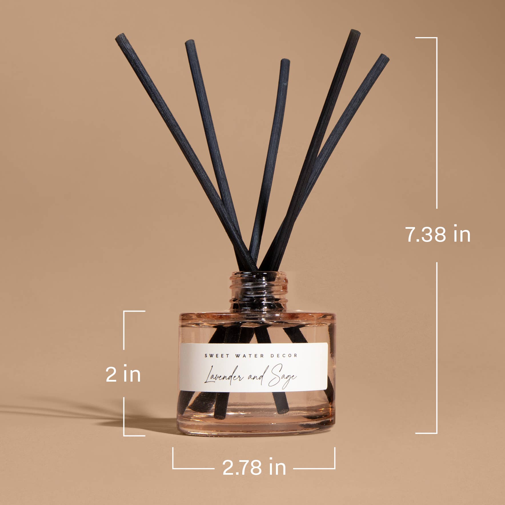 Wildflowers and salt reed diffuser size guide showing beige glass jar with black reeds and dimensions