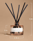 Wildflowers and salt reed diffuser size guide showing beige glass jar with black reeds and dimensions